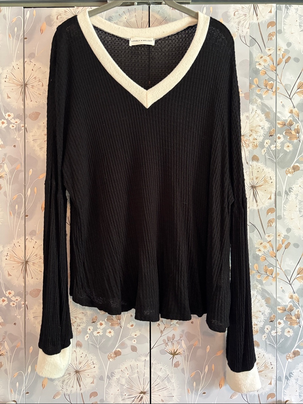Lovely Melody Black V‑Neck Long Sleeve Top with White Trim
